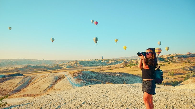 Tips - This is a Photograph of Girl using camera